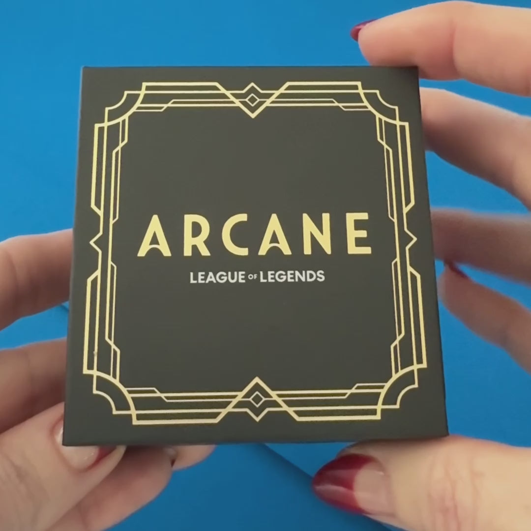 Arcane × RockLove Jinx Monkey necklace shown with collectible Arcane × RockLove jewelry box